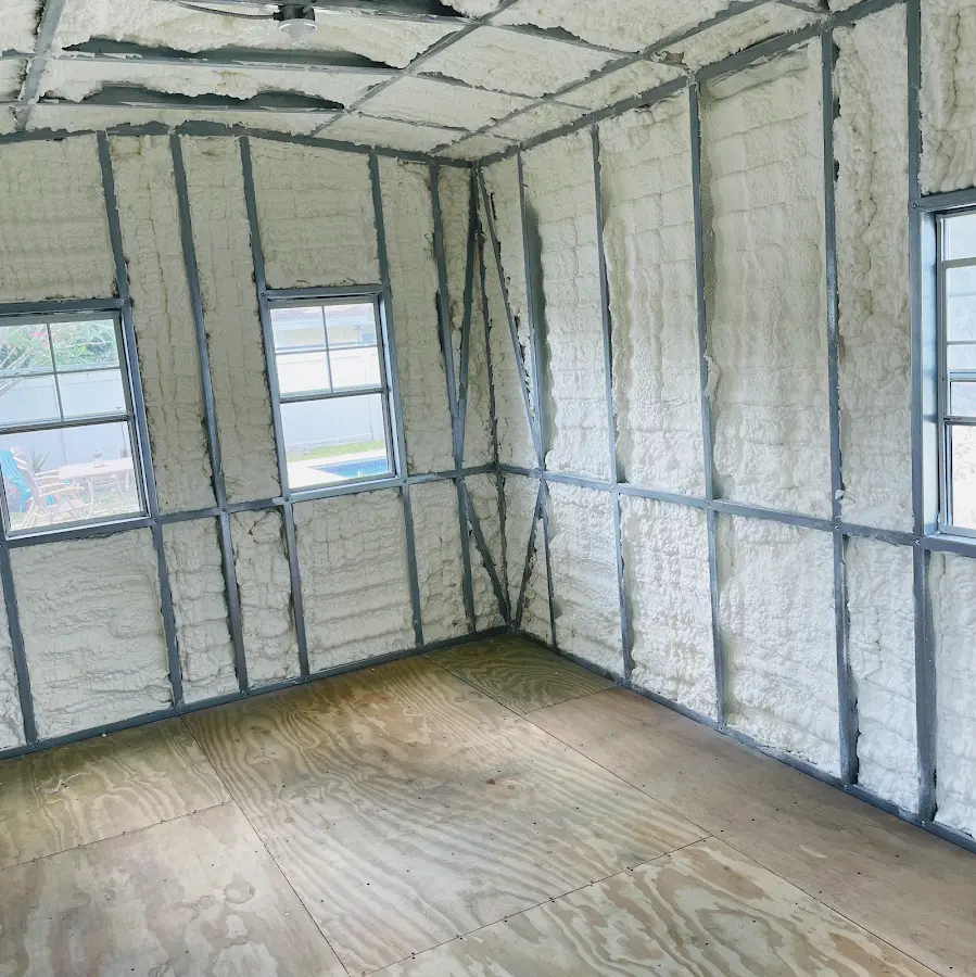 Closed-cell spray foam insulation applied to wall cavities in a residential project in Goldenrod